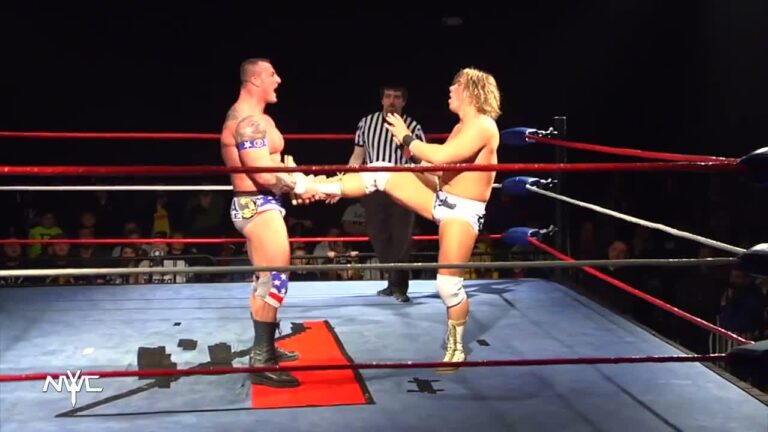 Muscle Takes Out Blond Wrestler